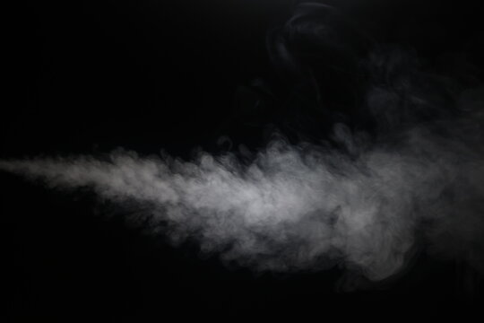 white smoke steam spray, and abstract vapor water isolated on a black background. concept of texture cold mist or hot vapor, element smog ,fog effect, and cloud for design air pollution