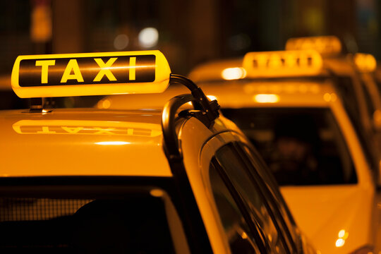 Germany, Bavaria, Munich, Illuminated sign on taxi showing availability