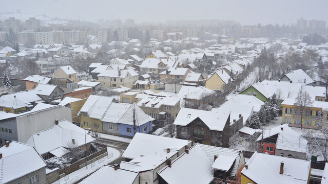 A winter's day, with snow-covered rooftops at Christmas time in Targu Mures.