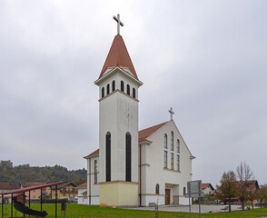 Naklejka premium Parish Church of St Anthony of Padua in Vojnic Croatia Cloudy Autumn Day