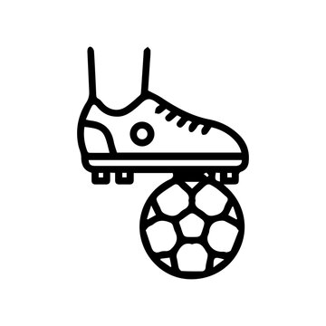 Football boot on soccer ball