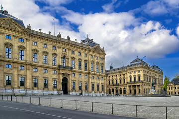 Fototapeta premium Wurzburg Residence main facade view from Residence Square in Wurzburg, Germany. Wide exterior perspective under a cloudy sky