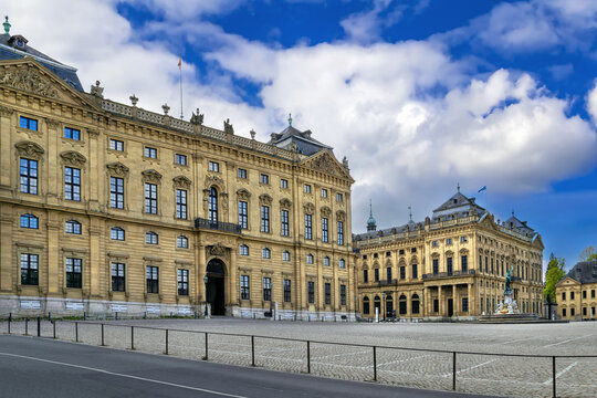 Wurzburg Residence main facade view from Residence Square in Wurzburg, Germany. Wide exterior perspective under a cloudy sky