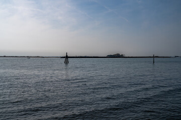 Fototapeta premium Wide Coastal Lagoon with Navigation Markers