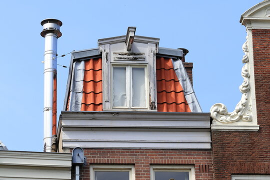 Historical House Roof Top with Steel Chimey in Amsterdam, Netherlands