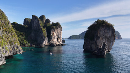 Fototapeta premium Aerial View of Limestone Karst Cliffs and Turquoise Water in Phi Phi Islands