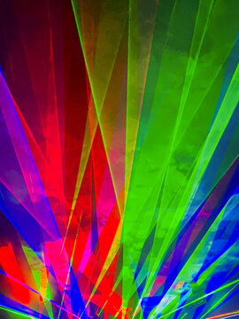 radiant colorful neon laser light show during music concert 