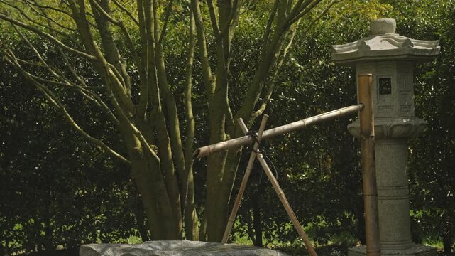 Bamboo Water Spout Beside Stone Lantern In Zen Garden, Slow Drip, Moss Covered Stones, Tranquil Reflections,