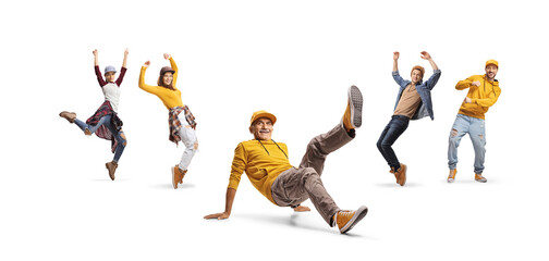 Naklejka premium Senior man breakdancing with a group of young dancers