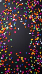 Obraz premium Multicolored confetti pieces scattered on a dark background, perfect for Halloween party decoration, festive, colorful