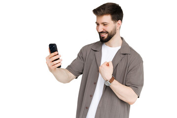 Naklejka premium Young man with phone on white background. .