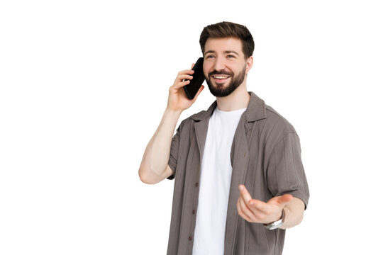 Handsome young man in casual shirt talk phone standing isolated over white background. Phone call concept