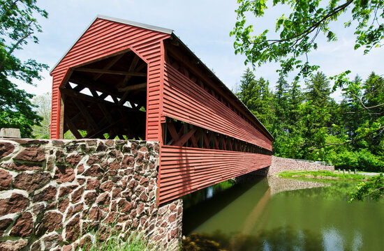 Haunted Sachs Covered Bridge over calm Marsh Creek
