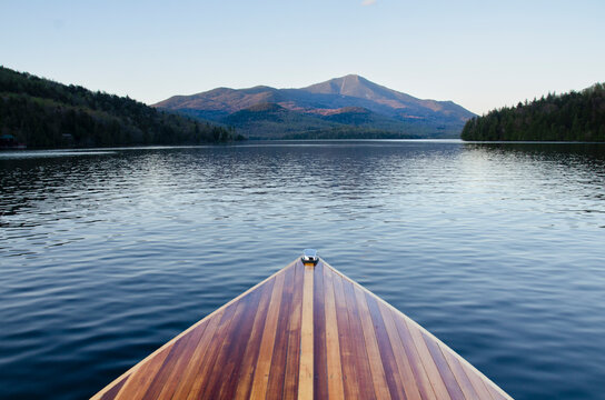 Bow of wooden boat on Lake Placid