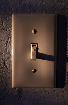 Close-up of light switch in off position