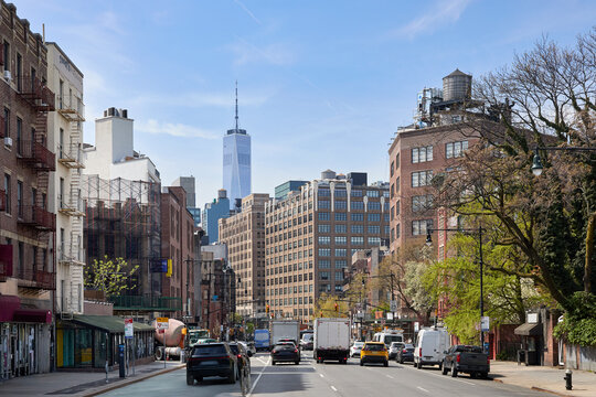 Traffic on street with One World Trade Center in background