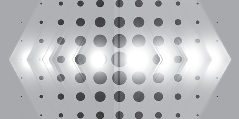 A modern abstract graphic design with a futuristic feel in grayscale (monochrome). Over the dotted pattern is a transparent, layered layer of arrows or chevrons. © AunurRafiq