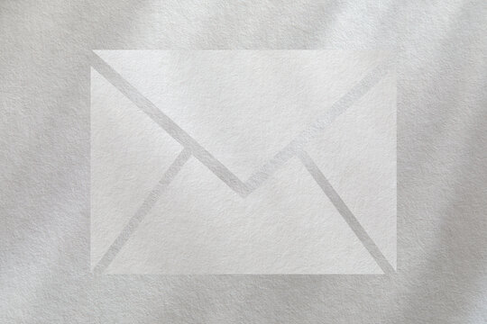 Mail icon on white textured background