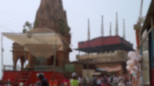 Bokeh view of Manikarnika Ghat is one of the ghats and is most known for being a place of Hindu cremation in Varanasi, India. Blurred background footage.