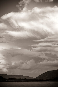 Dramatic clouds over mountains, black and white