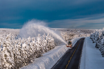Snowblower is clearing snow off the shoulders of the Cabot Trail in the Cape Breton Highlands National Park. © Michel JS Soucy
