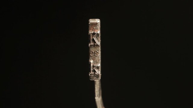 The letter K with an old typewriter hammer 