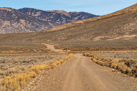 Empty rural dirt road over Trail Creek Pass