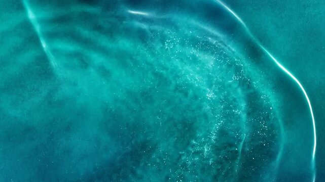 Mesmerizing turquoise ocean waves crashing serenely