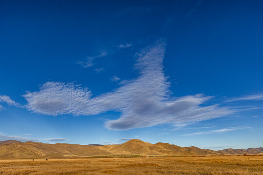 Unusual cloud shapes over open country