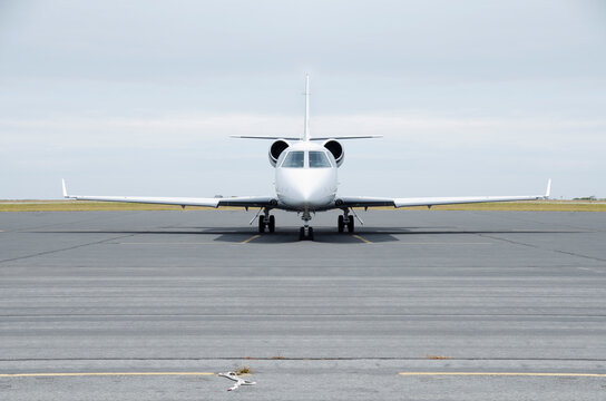 Private jet on airport tarmac