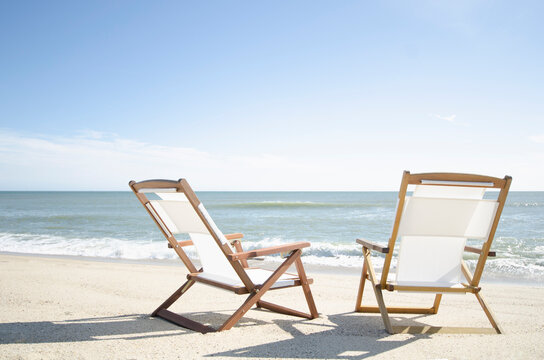Two deck chairs on empty Madaket Beach