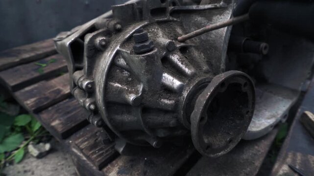 manual transmission from an old car removed for cleaning and washing, repair and replacement of oil seals