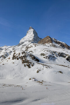 The most famous Swiss Alsp landscape Matterhorn over the Schwarzsee Lake Chapel Our Lady of the Snows in winter