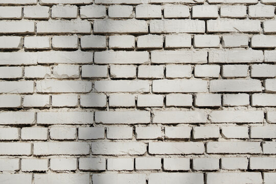 White painted brick wall texture with regular pattern
