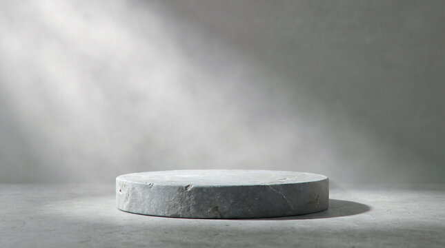 Empty stone podium standing gracefully against dark concrete wall illuminated by bright dramatic spotlight creating perfect minimal product display presentation background