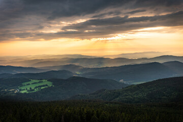 Obraz premium Golden sunlight over landscape around Jeseniky mountains
