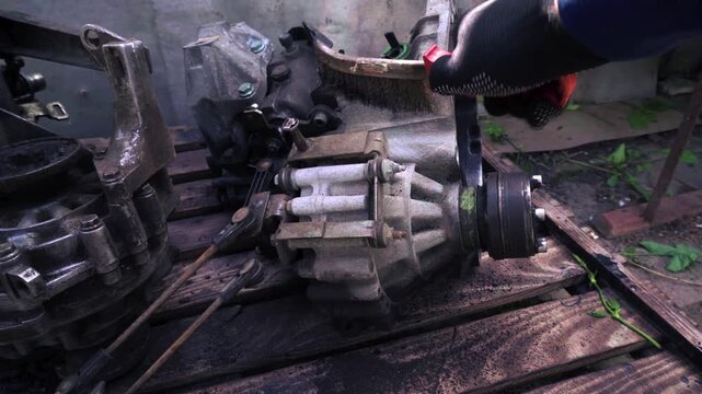manual transmission from an old car removed for cleaning and washing, repair and replacement of oil seals