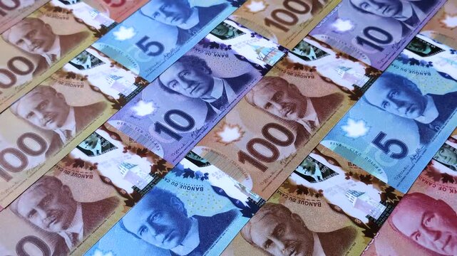 Money, currency of Canada, dollar banknotes of various denominations. Canadian money as a financial background for your design