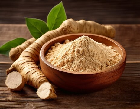 maca root powder in a wooden bowl with fresh maca roots on a wooden background