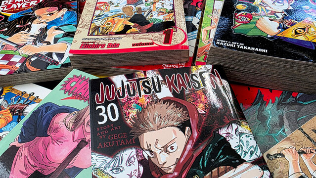 Close up of a stack of Shonen Jump manga including Jujutsu Kaisen Volume 30 laying on a floor, May 28, 2026, Schaumburg IL