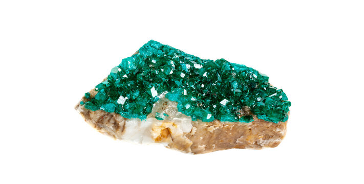 Raw dioptase mineral specimen with transparent crystalline structure. Beautiful natural gemstone sample from copper deposits, featuring vivid emerald-green coloration and matrix texture.