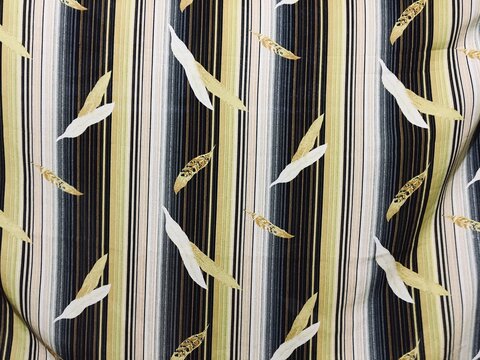 Fabric cloth seamless pattern texture with falling leafs background.