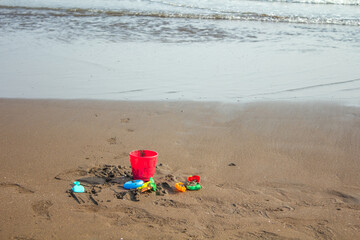children's toys on the beach © Musrifin