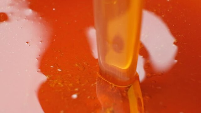 Natural maple syrup flow, slow motion.