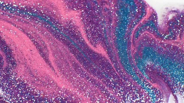 Mesmerizing Swirls of Glitter Slime in Purple and Teal.