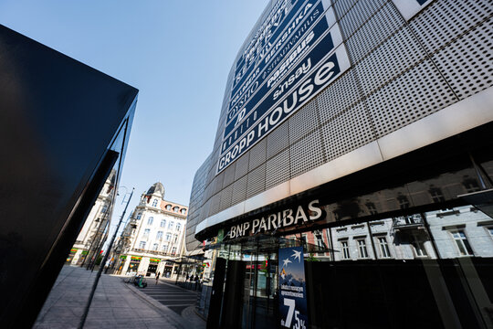 Business storefront and modern shopping facade in Katowice Poland with BNP Paribas signage and city street activity