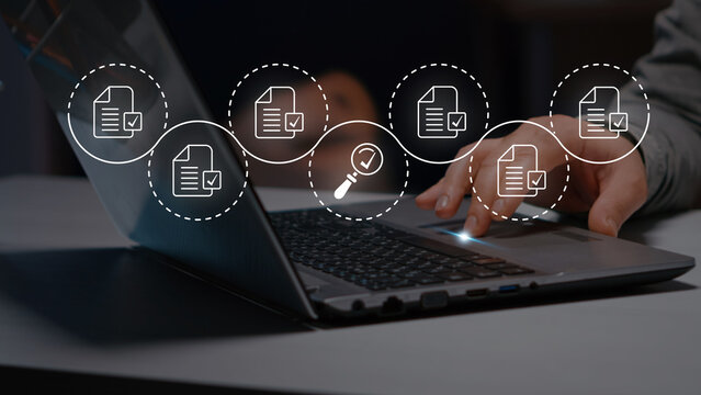 Document Management System (DMS) concept. Using laptop for DMS with a futuristic digital interface representing workflow automation, data organization and secure document processing.