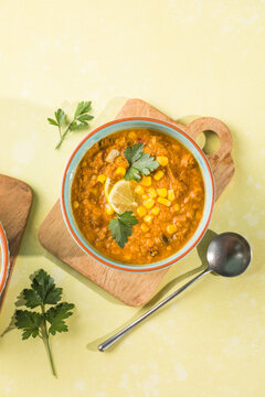 Homemade Corn Chowder in a Bowl, top view. Flat lay, overhead, from above. Close-up.