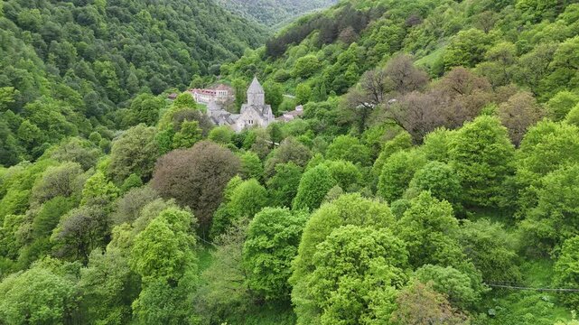 4K UHD Drone Aerial View of Haghartsin Monastery Hidden in Lush Forested Mountains.