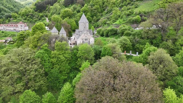 4K UHD Drone Aerial View of Haghartsin Monastery Hidden in Lush Forested Mountains.